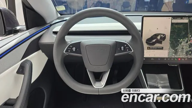 Tesla Model Y — Фото автомобиля 13
