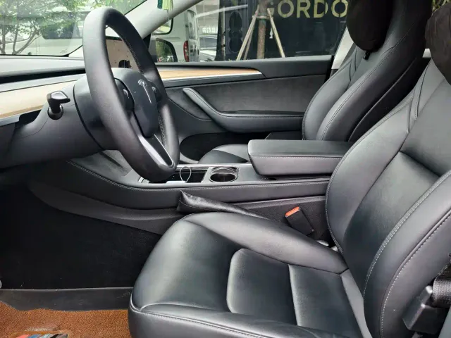 Tesla Model Y — Фото автомобиля 7