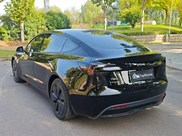 Tesla Model 3 — Фото автомобиля 7