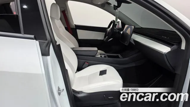 Tesla Model Y — Фото автомобиля 20
