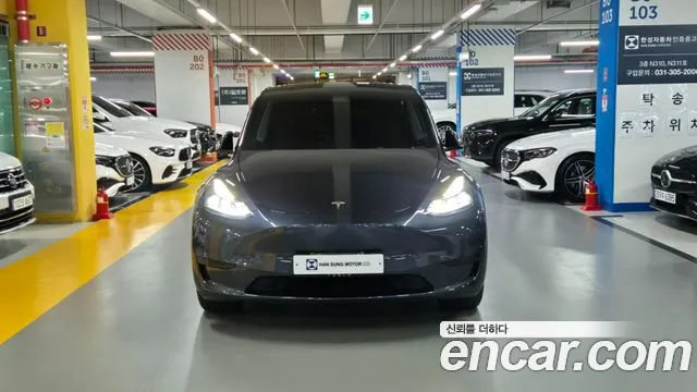 Tesla Model Y — Фото автомобиля 3
