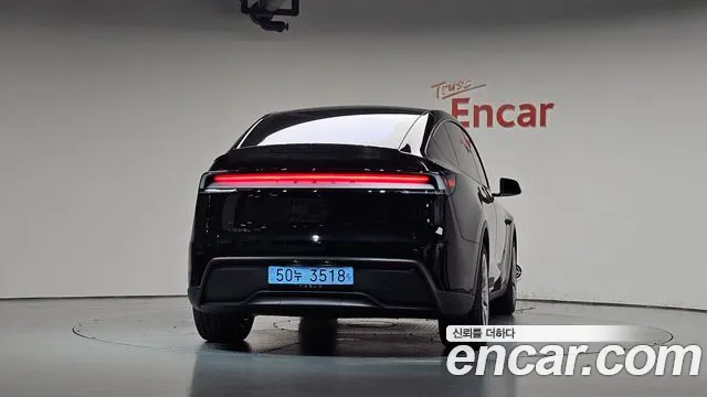 Tesla Model Y — Фото автомобиля 4