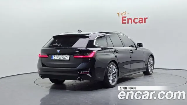 BMW 3-Series 3 серия (G20) 320i Touring Luxury — Фото автомобиля 2