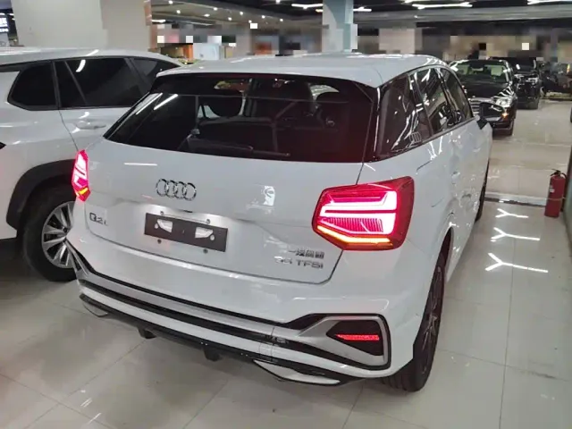 Audi Q2L — Фото автомобиля 6