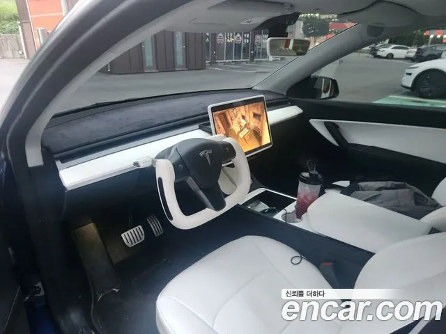 Tesla Model Y — Фото автомобиля 5