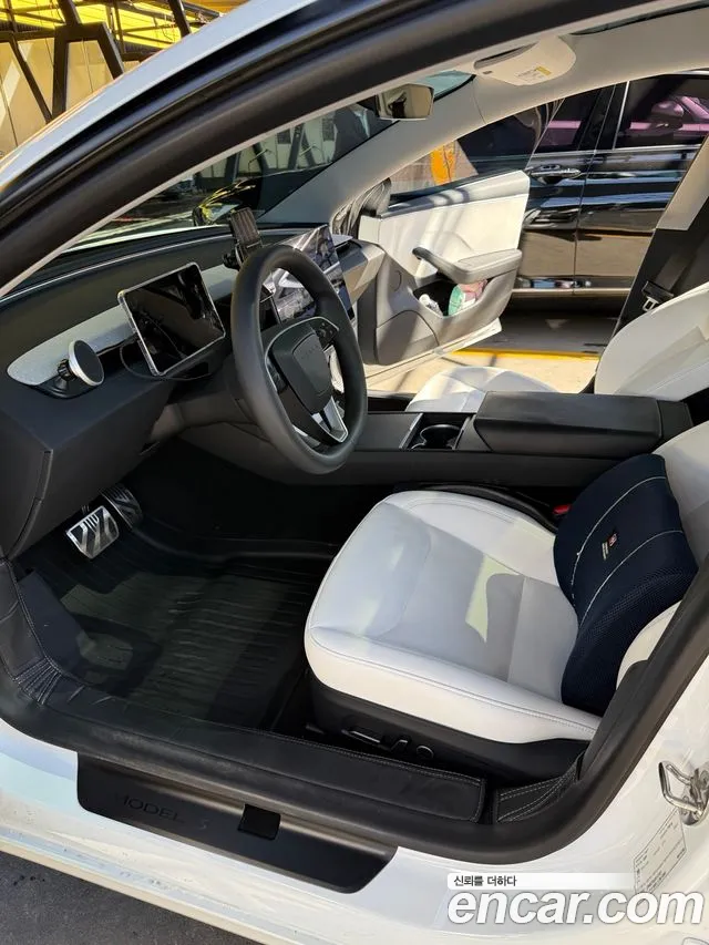 Tesla Model 3 — Фото автомобиля 9
