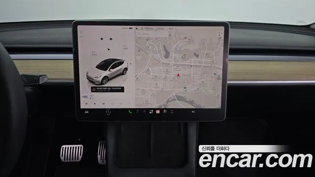 Tesla Model Y — Фото автомобиля 13