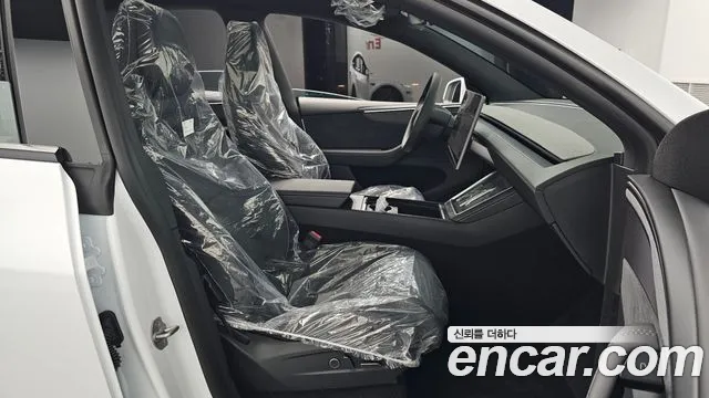 Tesla Model Y — Фото автомобиля 25
