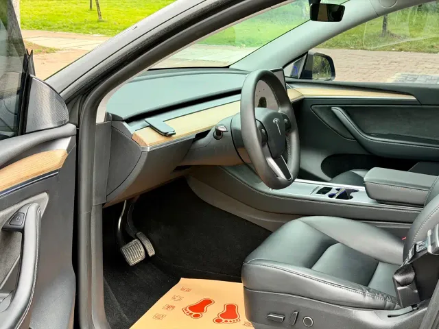 Tesla Model Y — Фото автомобиля 7