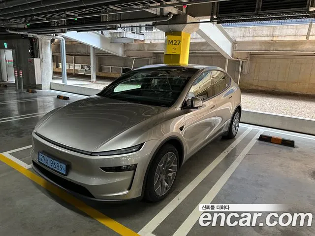 Tesla Model Y — Фото автомобиля 16