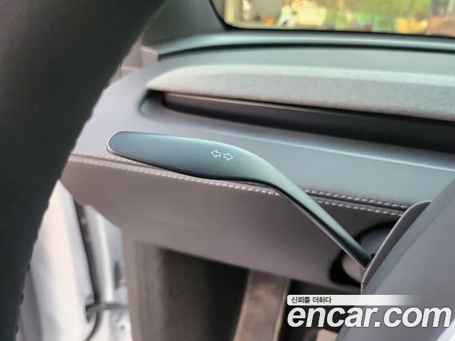 Tesla Model Y — Фото автомобиля 13