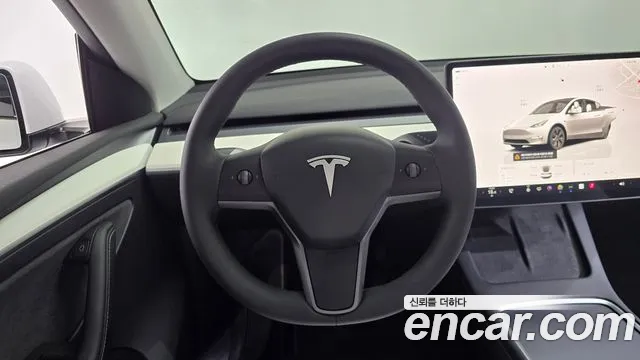 Tesla Model Y — Фото автомобиля 11