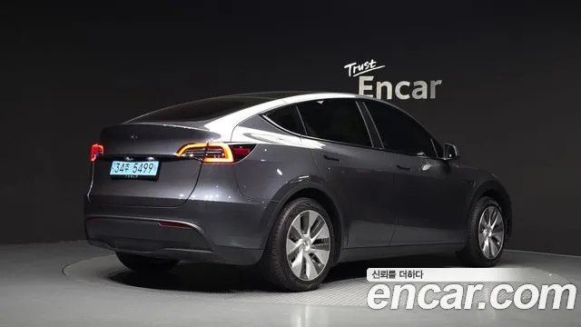 Tesla Model Y — Фото автомобиля 2