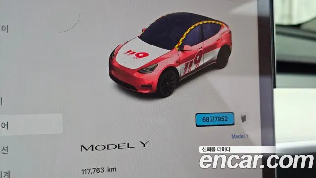 Tesla Model Y — Фото автомобиля 11