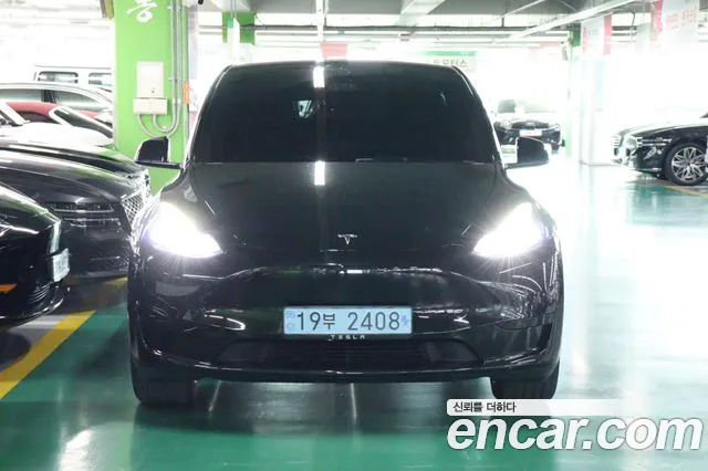 Tesla Model Y — Фото автомобиля 3