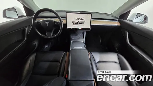 Tesla Model Y — Фото автомобиля 10