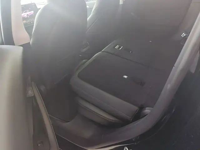 Tesla Model Y — Фото автомобиля 16