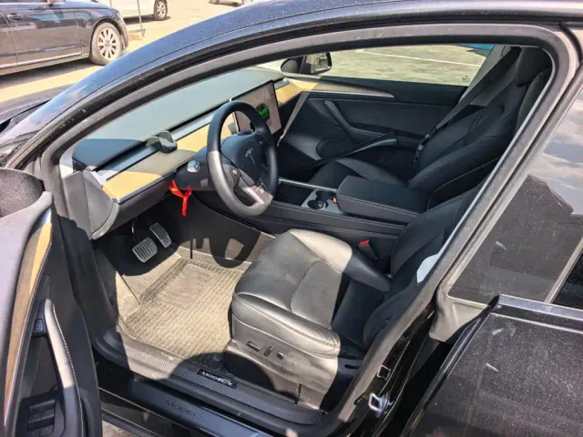 Tesla Model Y — Фото автомобиля 8