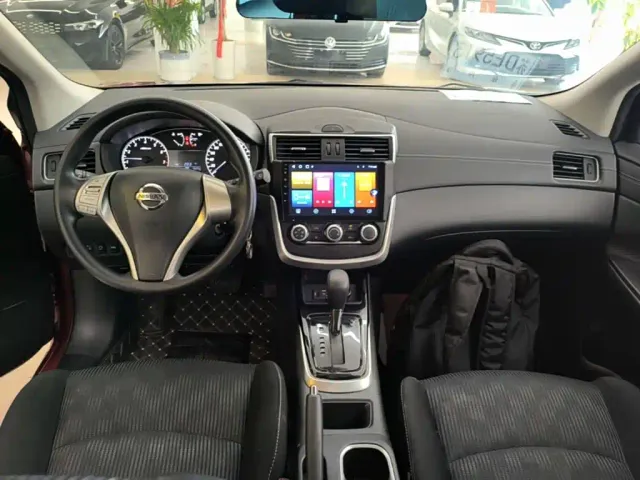 Nissan Tiida — Фото автомобиля 9