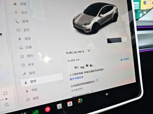 Tesla Model Y — Фото автомобиля 11