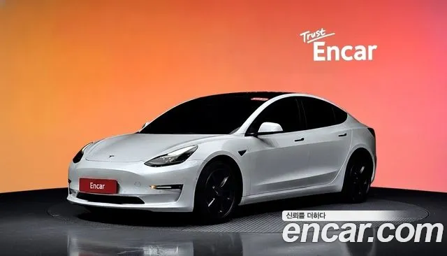 Tesla Model 3 — Фото автомобиля 6