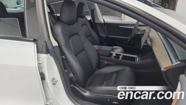 Tesla Model 3 — Фото автомобиля 11