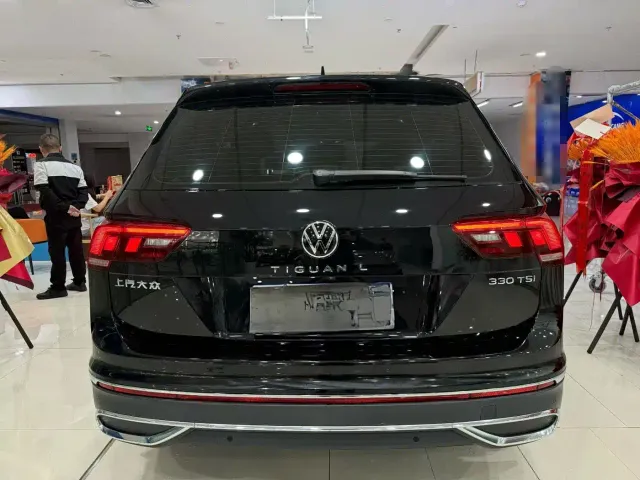 Volkswagen Tiguan L — Фото автомобиля 5