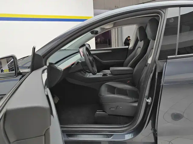 Tesla Model Y — Фото автомобиля 9