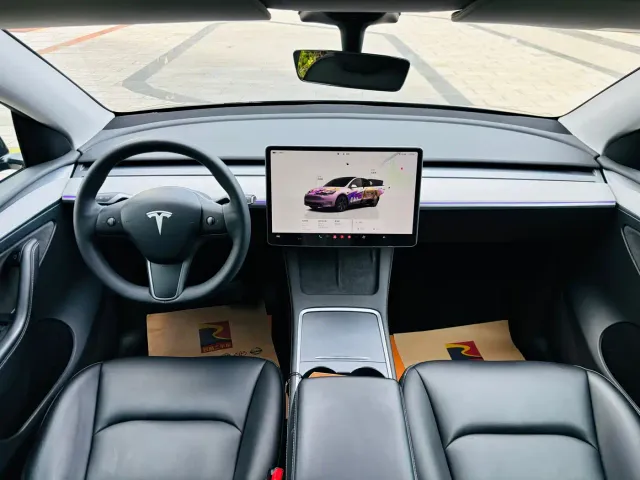 Tesla Model Y — Фото автомобиля 9