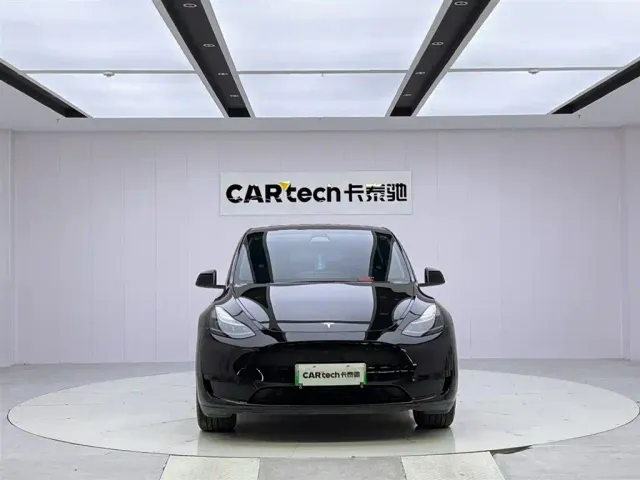 Tesla Model Y — Фото автомобиля 8