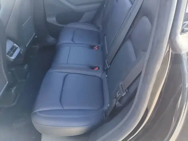 Tesla Model Y — Фото автомобиля 16