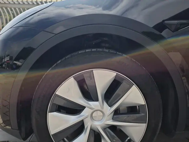 Tesla Model Y — Фото автомобиля 13