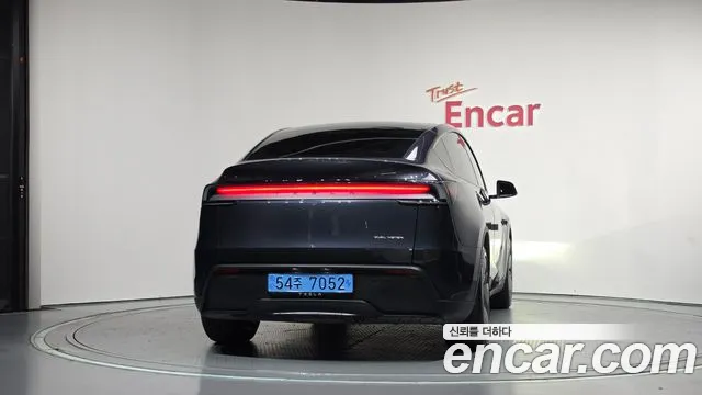 Tesla Model Y — Фото автомобиля 4