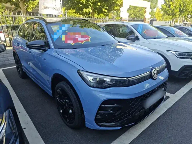Volkswagen Tiguan L — Фото автомобиля 3