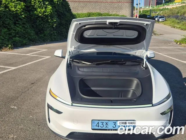 Tesla Model Y — Фото автомобиля 4