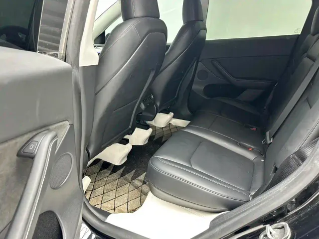 Tesla Model Y — Фото автомобиля 7