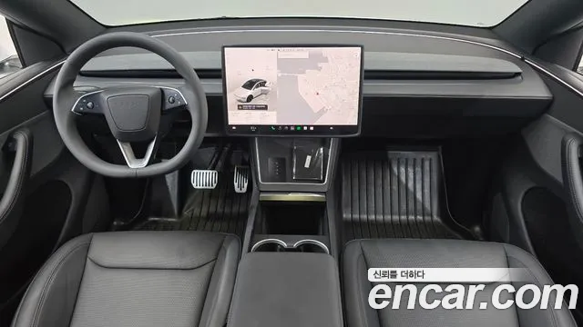 Tesla Model Y — Фото автомобиля 10