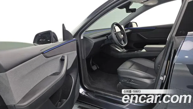Tesla Model Y — Фото автомобиля 10