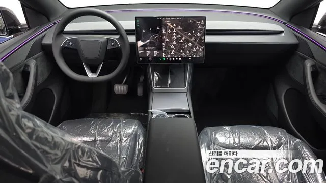 Tesla Model Y — Фото автомобиля 10