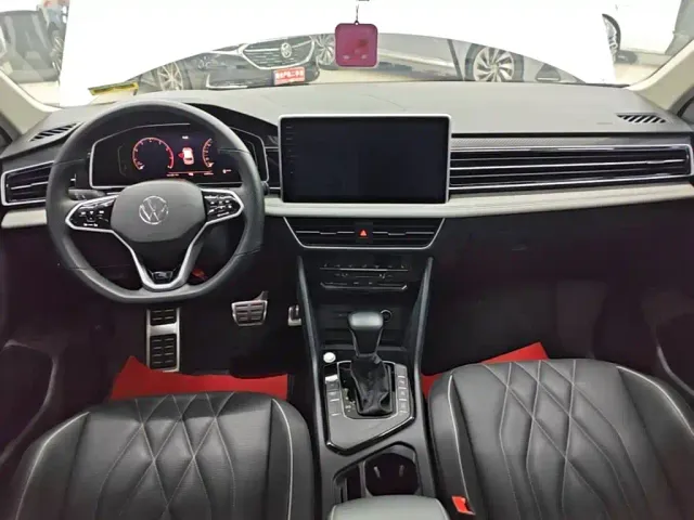Volkswagen Tiguan L — Фото автомобиля 9