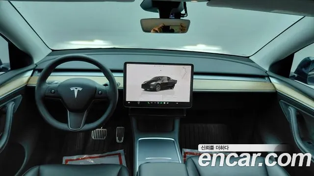Tesla Model Y — Фото автомобиля 7