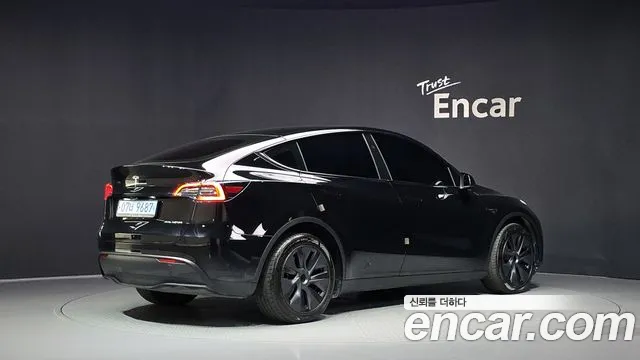 Tesla Model Y — Фото автомобиля 2