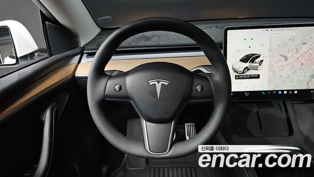 Tesla Model Y — Фото автомобиля 18