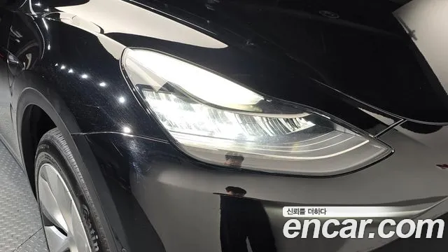 Tesla Model Y — Фото автомобиля 7