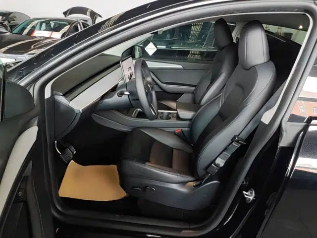 Tesla Model Y — Фото автомобиля 14