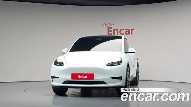 Tesla Model Y — Фото автомобиля 3