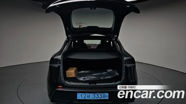 Tesla Model Y — Фото автомобиля 19