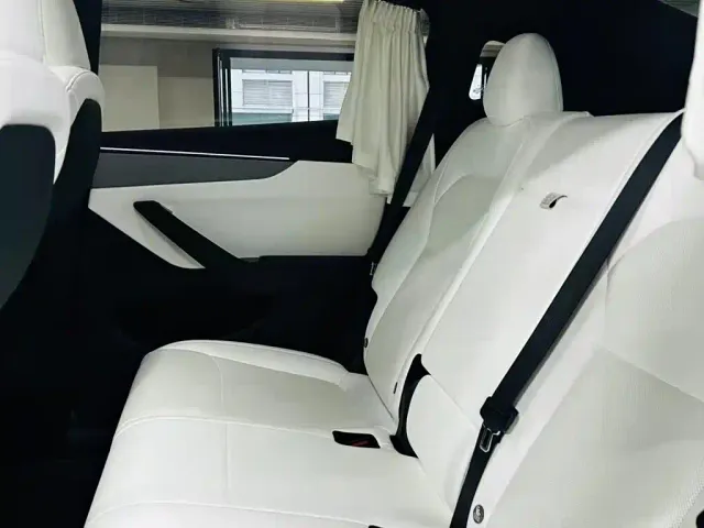 Tesla Model Y — Фото автомобиля 9