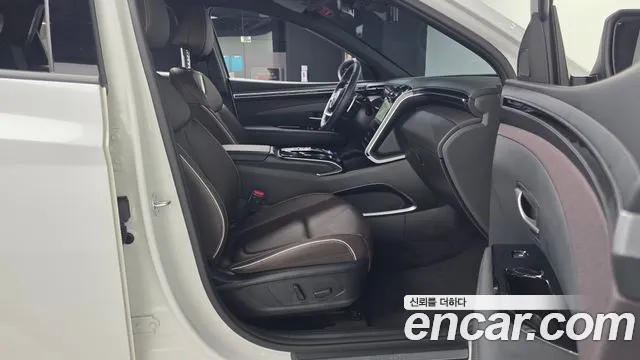 Hyundai Tucson Tucson (NX4) Бензин 1.6 турбо 2WD — Фото автомобиля 11