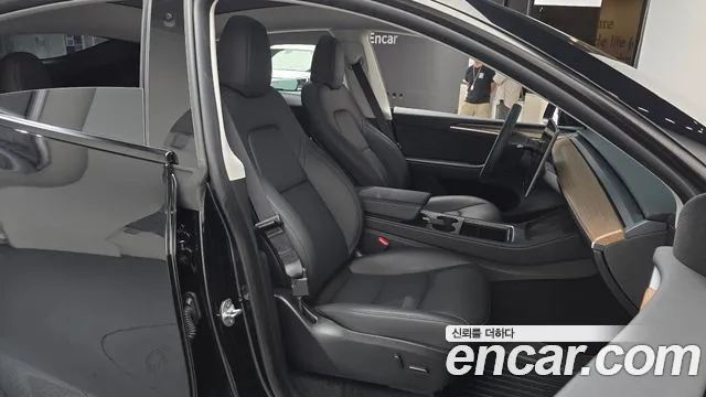 Tesla Model Y — Фото автомобиля 16